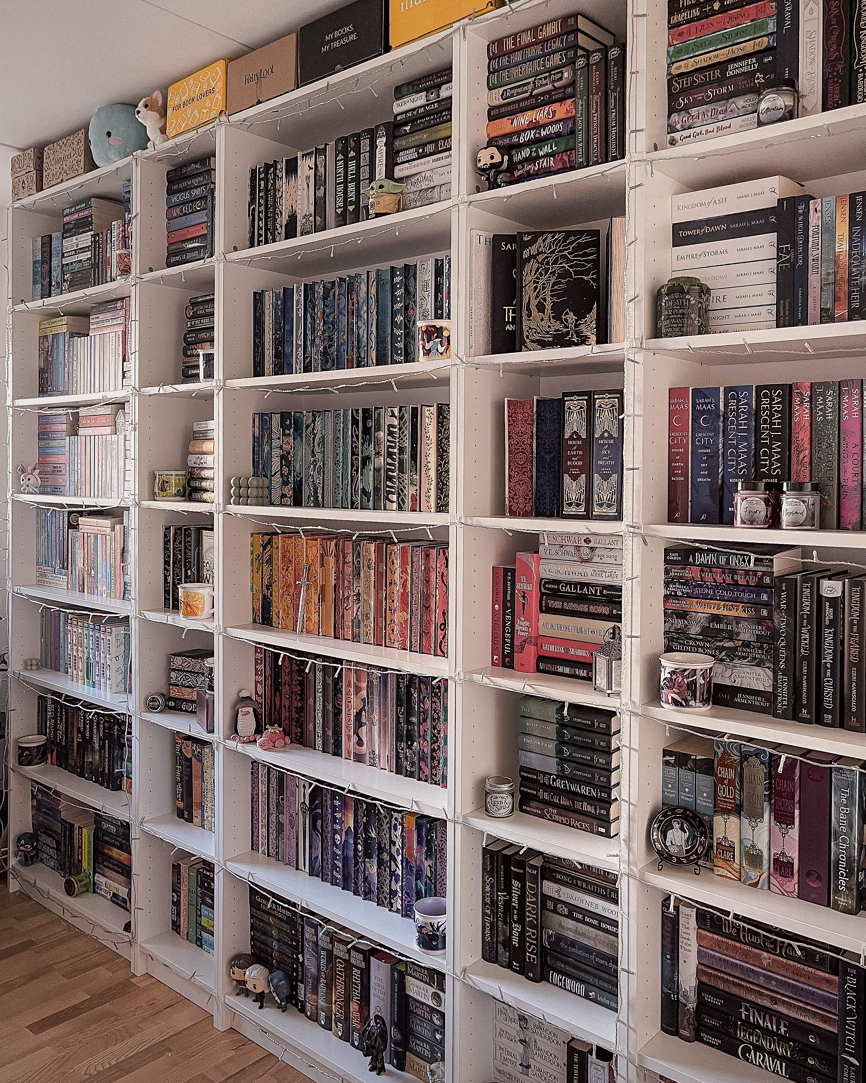 Beautiful and colorful bookshelves with many books on them